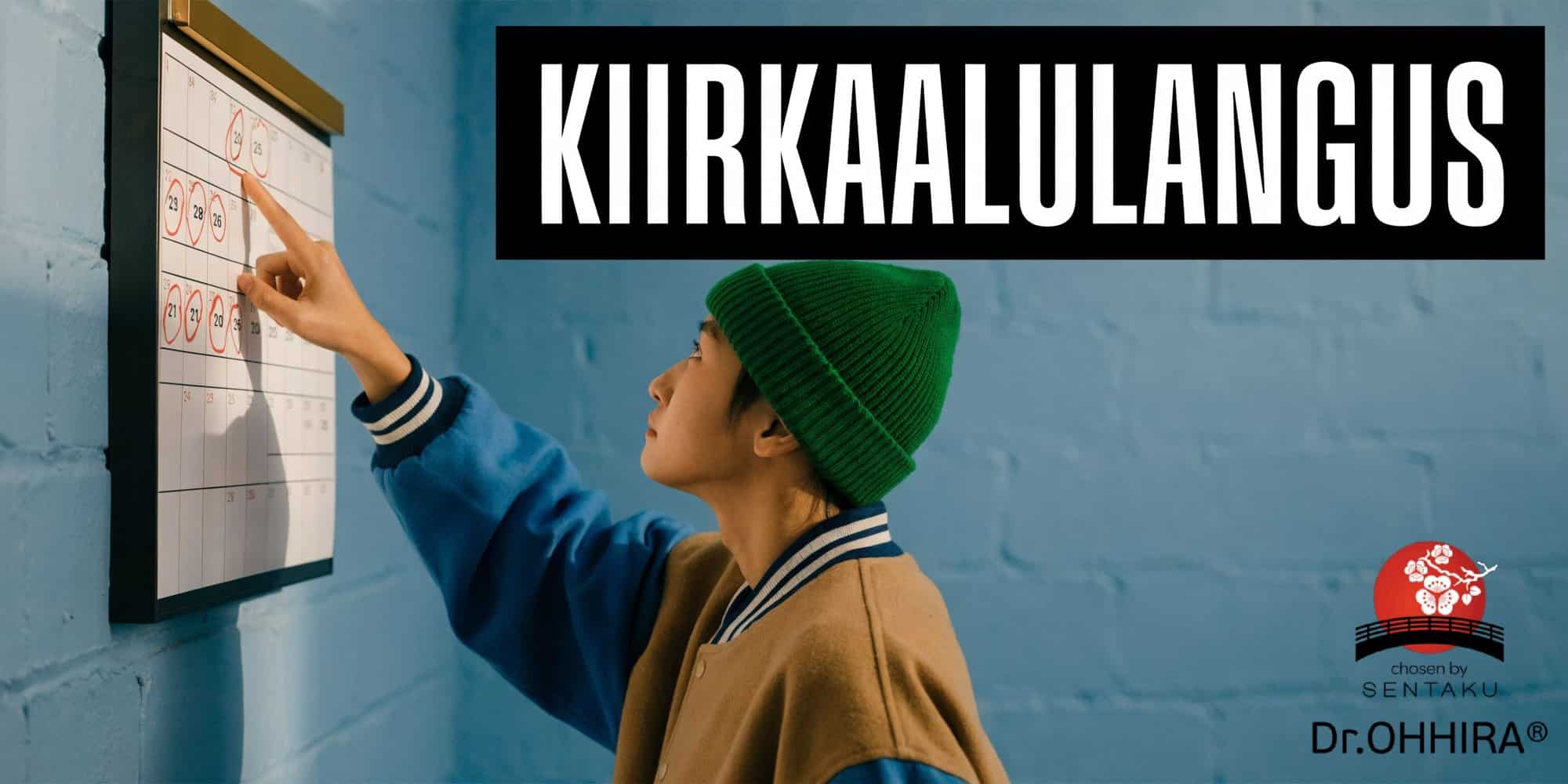 Noor inimene osutab kalendrile, kus on ringitud kuupäevad, viidates kaalulangetusele ja dieedile.